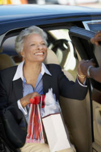 Image of smiling woman using local medical transportation services